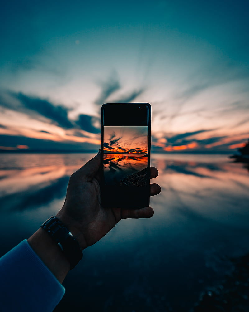 Phone, hand, sunset, horizon, HD phone wallpaper | Peakpx