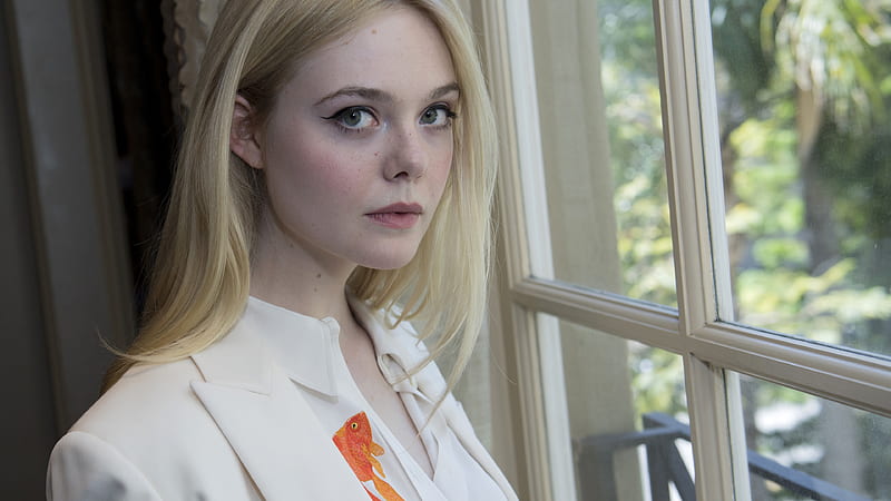 Mary Elle Fanning Is Standing With White Shirt And Coat Near Window Mary Elle Fanning, HD wallpaper