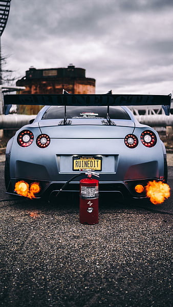 Live wallpaper Black, matte Nissan GTR with green exhaust / download to  desktop