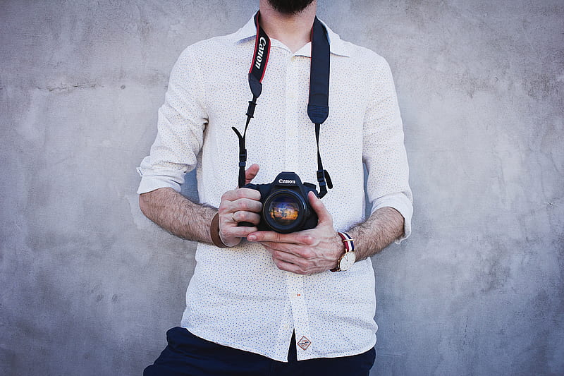 man in white dress shirt holding Canon DSLR camera, HD wallpaper