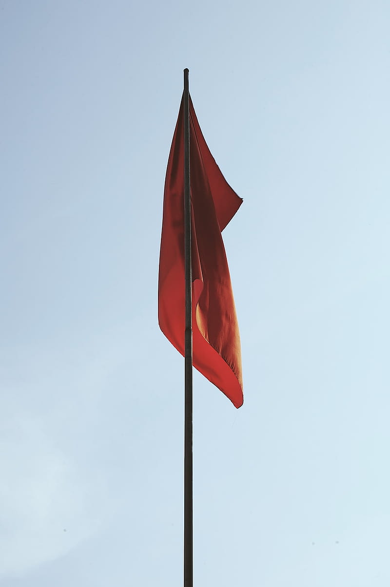 red flag on pole under white sky during daytime – Flag on Unsplash, Saffron Flag, HD phone wallpaper