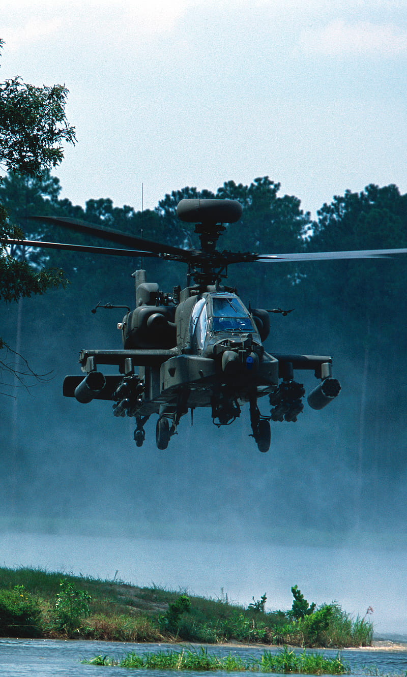 AgustaWestland Apache is a licence-built version of the AH-64D Apache  Longbow attack helicopter for the British Army. Down in trees. Tank killer  Stock Photo - Alamy
