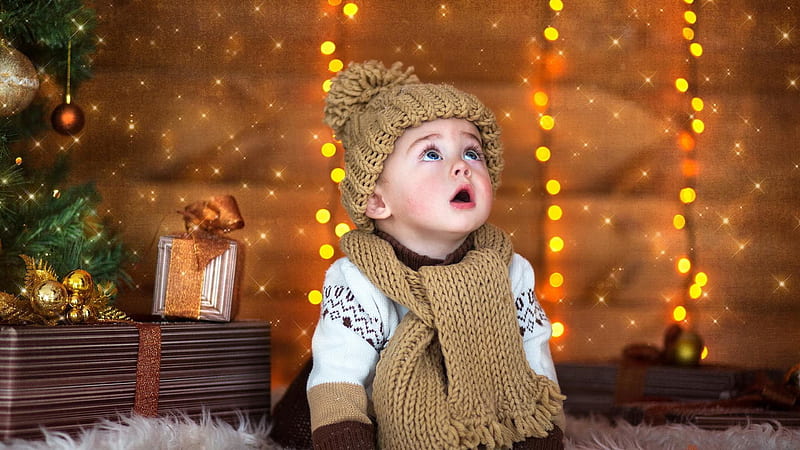 Cute Little Baby With Open Mouth Is Looking Up Wearing Woolen Knitted Cap And Muffler In Bokeh Lights Background Cute, HD wallpaper