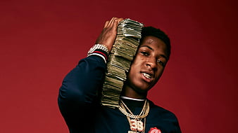 NBA Youngboy Is Wearing White T-Shirt And Red Overcoat Standing In