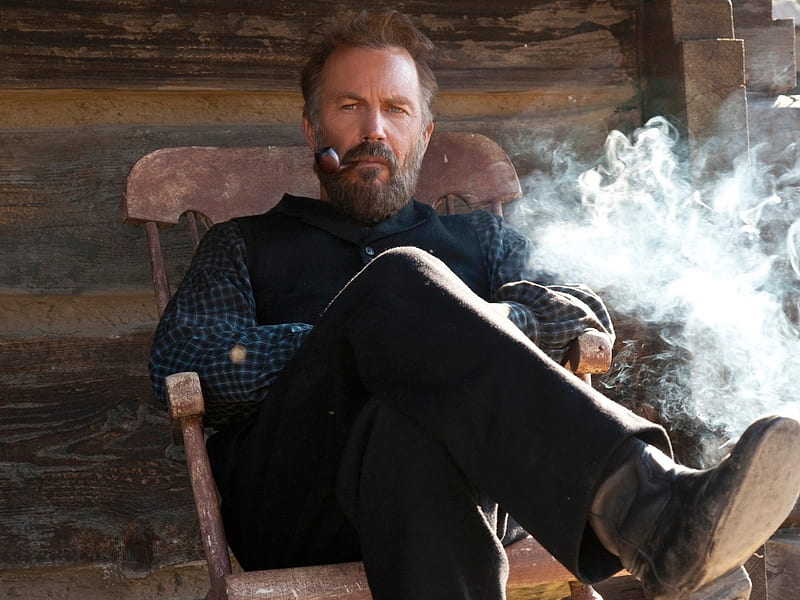 Kevin Costner in Yellowstone, Chair, Handsome, Man, Smoke, Pipe, Rugged, Cowboy, Boots, Cabin, HD wallpaper