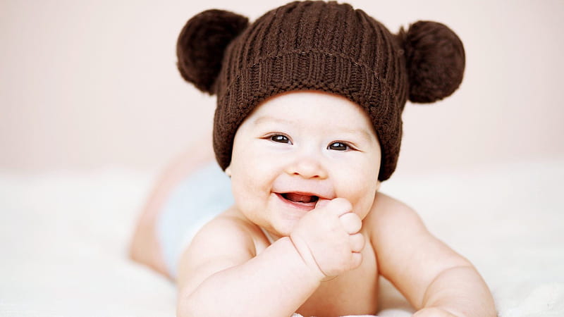 Cute Smiley Baby Is Wearing Brown Knitted Woolen Cap Having Hand On Mouth Cute, HD wallpaper
