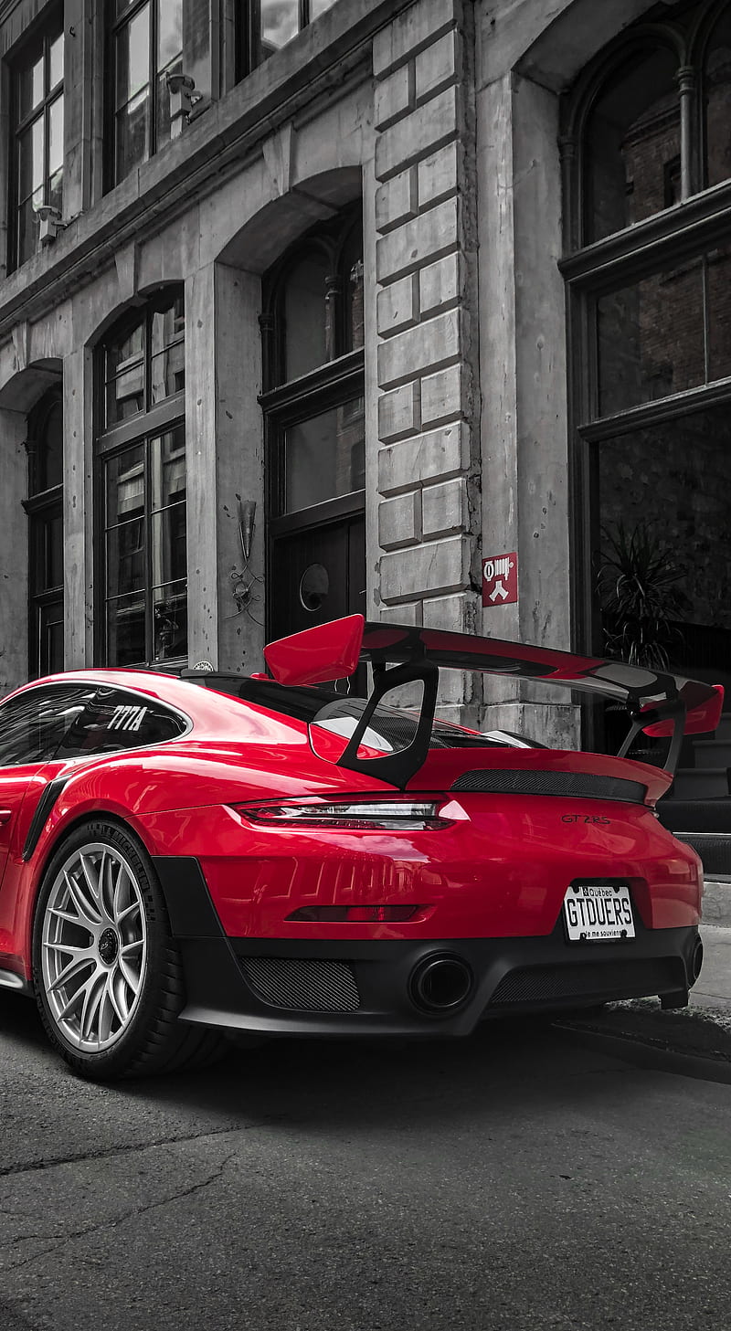 selective color graphy of red Porsche sports car parked at roadside, HD phone wallpaper