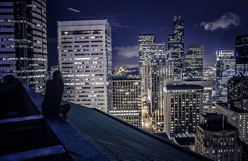 Woman sits on top of building in a big city, somber, cityscape, dark, sky,  woman, HD wallpaper | Peakpx
