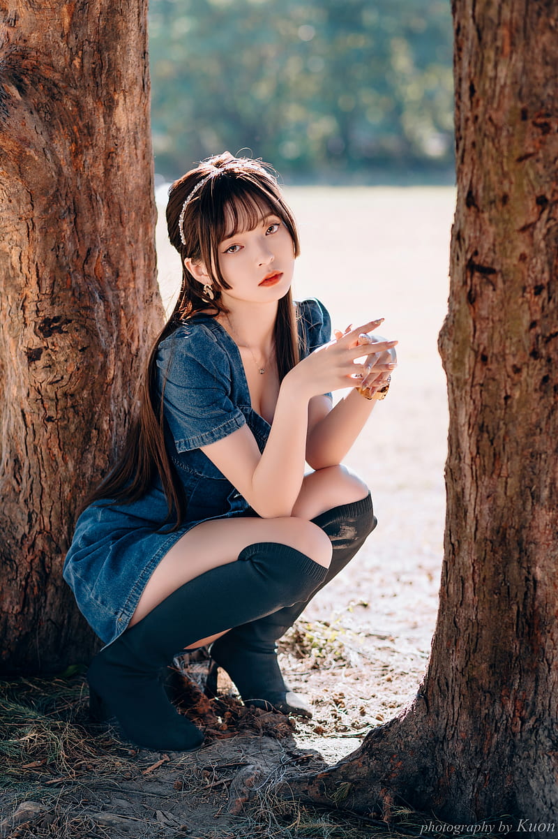 Asian, women, model, brunette, bangs, long hair, looking at viewer, parted lips, portrait display, vertical, necklace, dress, denim, boots, depth of field, trees, cleavage, outdoors, women outdoors, Chinese, knee-high boots, Chinese model, red lipstick, HD phone wallpaper