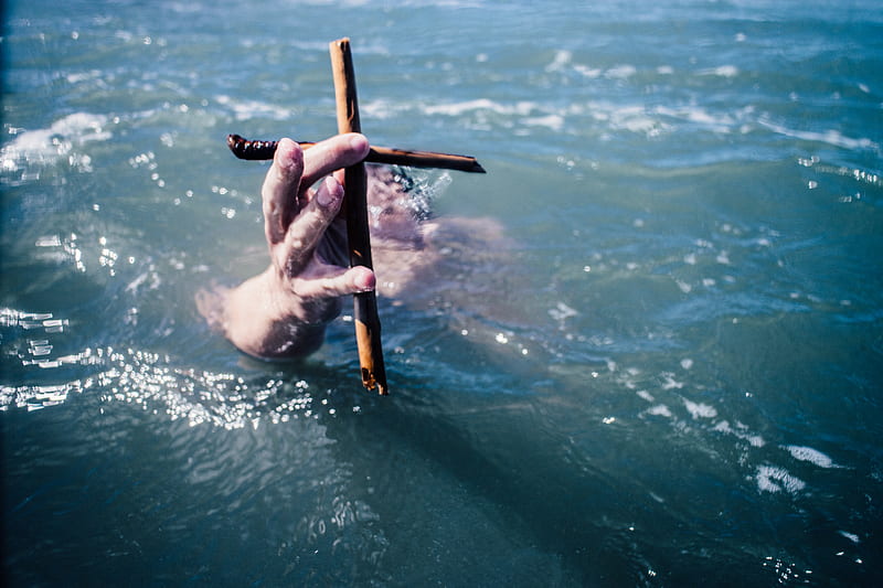 person under water holding brown wooden cross above water at daytime, HD wallpaper