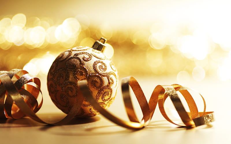 Golden Christmas ball New Year, golden background, golden silk ribbon ...