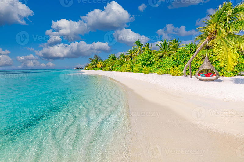 Tropical beach background as summer landscape with beach swing or hammock  and white sand and calm