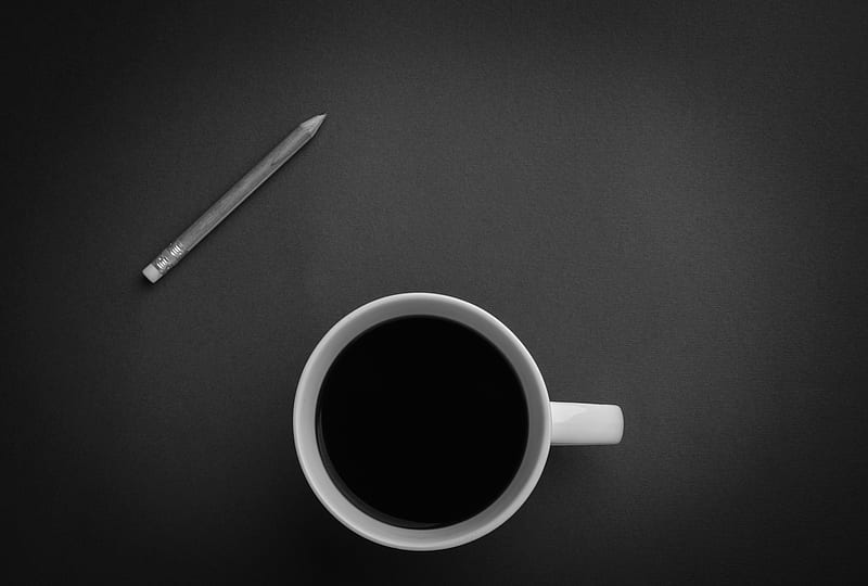 white ceramic teacup near gray pencil on black surface, HD wallpaper
