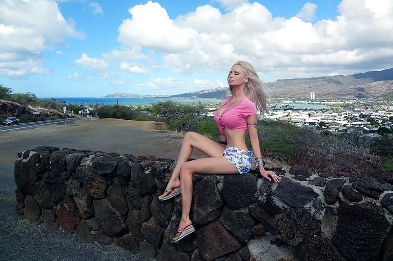 Valeria Lukyanova Barbie Doll look, sitting on stone wall, flip flops, breezy day, shorts, pink blouse, platinum blonde, road and cars, jewelry, bay area and hils, HD wallpaper