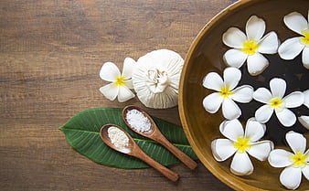 Bottle Of Essential Oil And Jasmin Flower With Plumeria Flower Setup On  Marble Table For Spa Relaxing Massage At Thailand Stock Photo - Download  Image Now - iStock