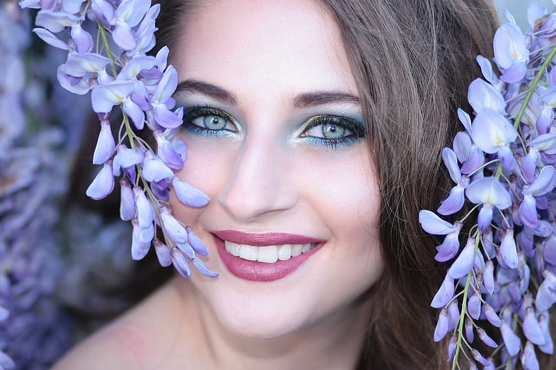 Beauty, girl, model, flower, face, smile, blue, wisteria, HD wallpaper