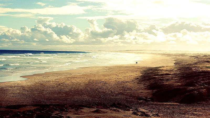 couple walking on a vast beach, beach, waves, clouds, vast, couple, sea, HD wallpaper