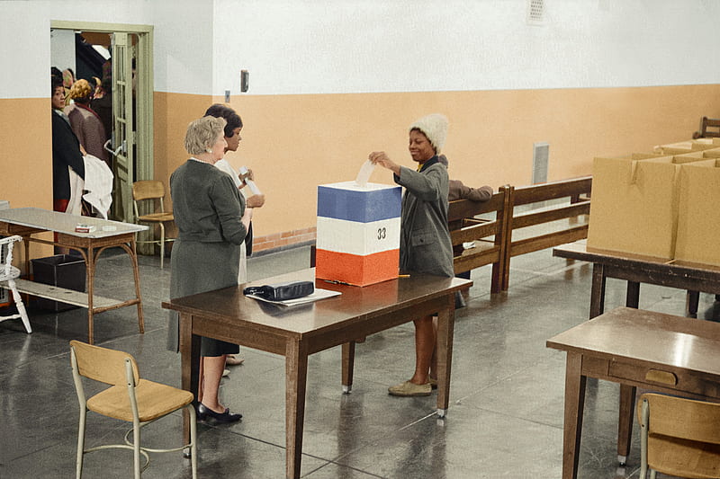 A young African American woman casting her ballot in 1964, HD wallpaper