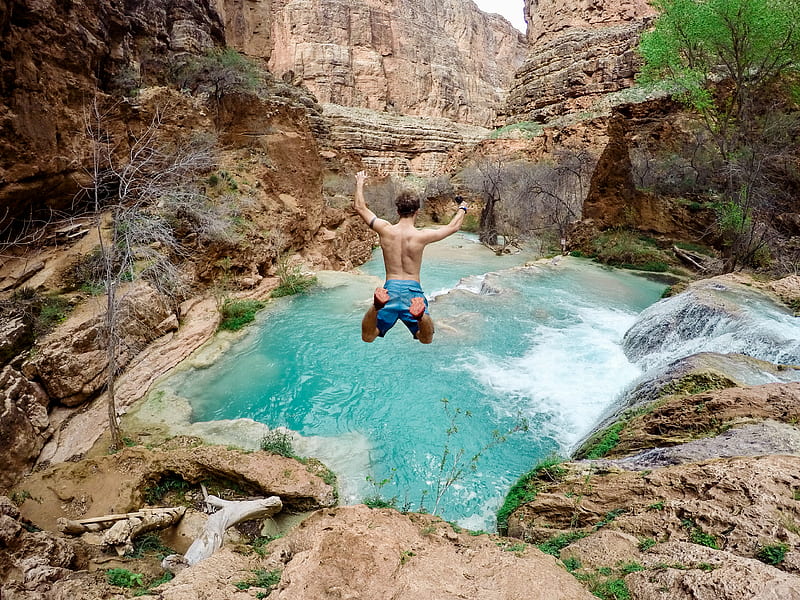 time lapse graphy of man jumping on waterfalls, HD wallpaper