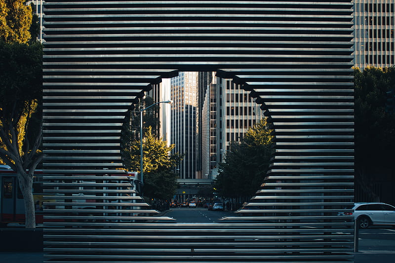 gray concrete building with hole near green trees during daytime, HD wallpaper