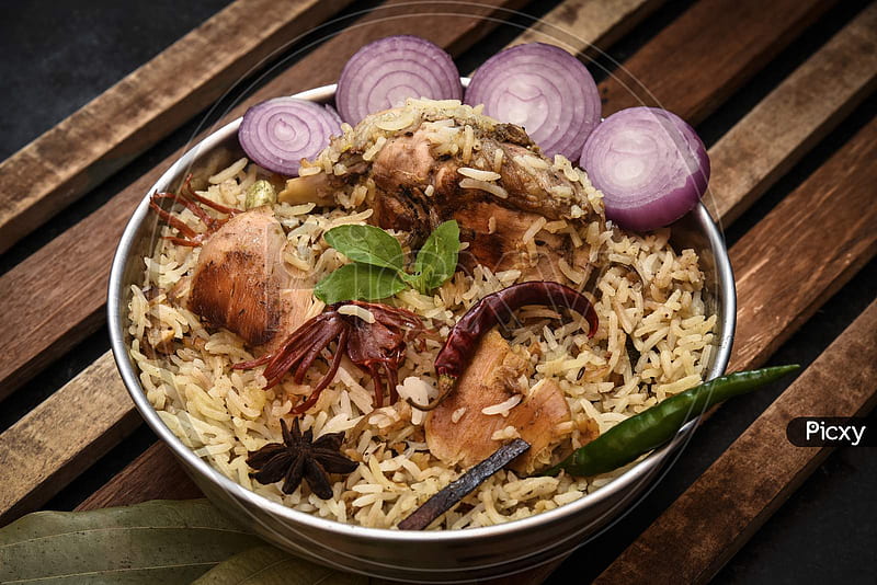 Of Delicious Chicken Biryani Top View.Biryani Rice Dish Beautiful Indian Rice Licious Spicy Chicken Biryani In Bowl Over Moody Background, It's A Popular Indian And Pakistani Food. WU871268 Picxy, HD wallpaper