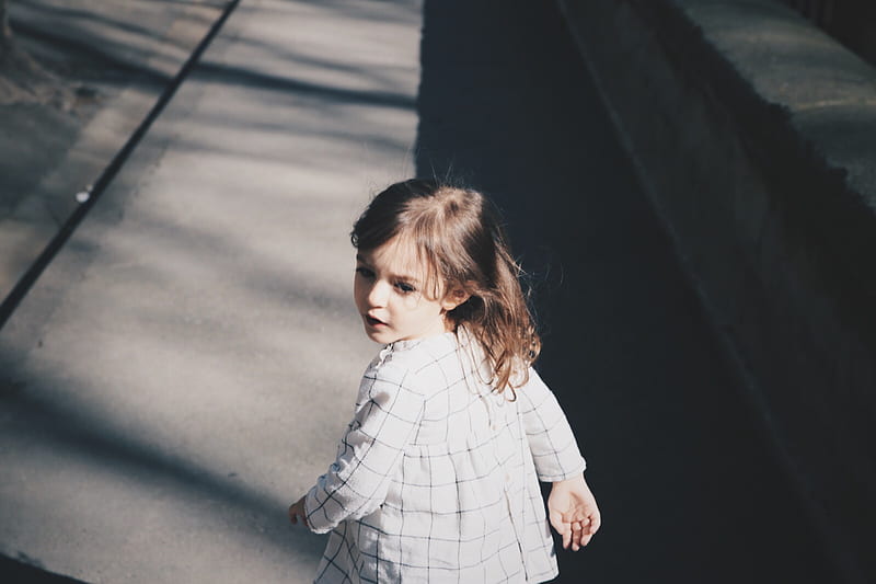 toddler girl walking on gray concrete road at daytime, HD wallpaper