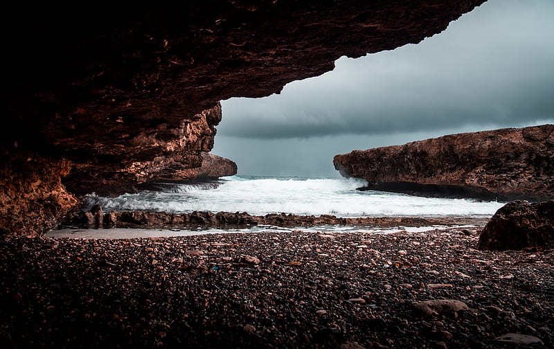 shore under rock formation during cloudy day, HD wallpaper