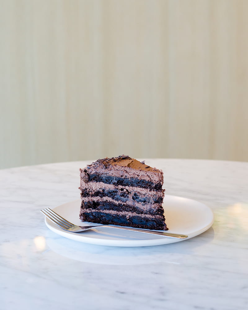 sliced chocolate cake beside fork on plate, HD phone wallpaper