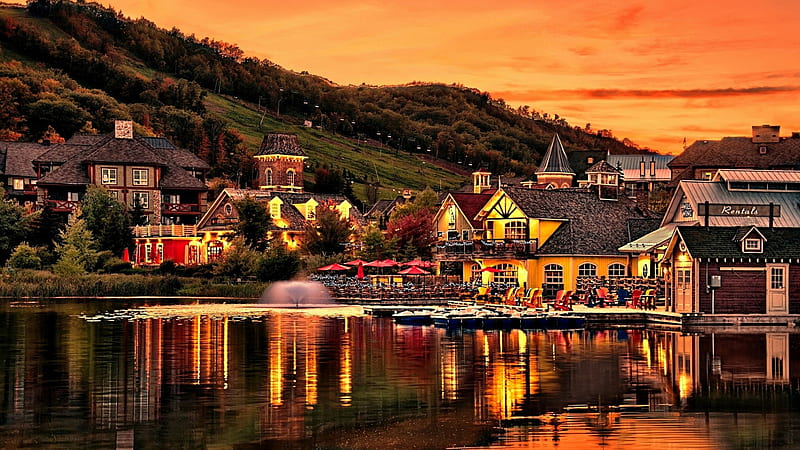 Lakeside Village at Sunset, hills, houses, sunset, trees, lake, boats, mountains, village, nature, reflection, HD wallpaper