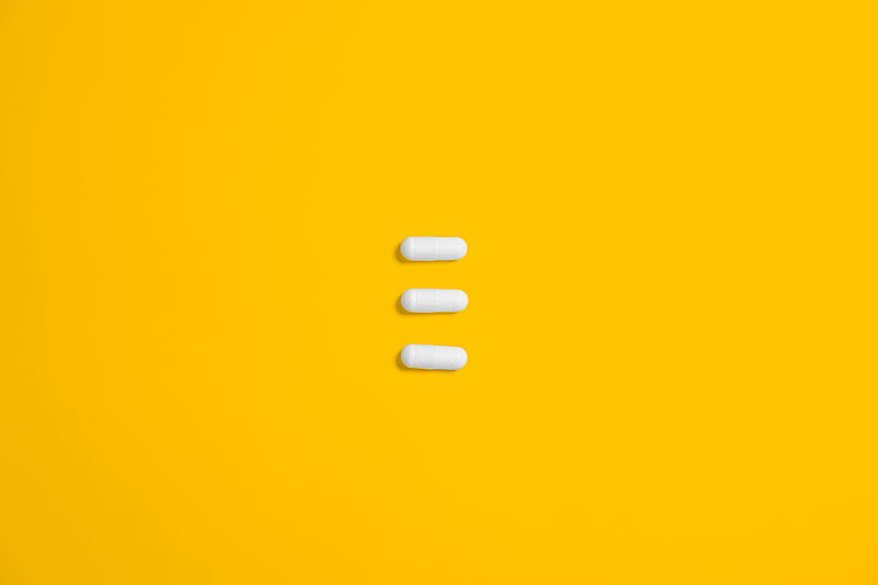 White Three Oval Capsule on Yellow Canvas, HD wallpaper