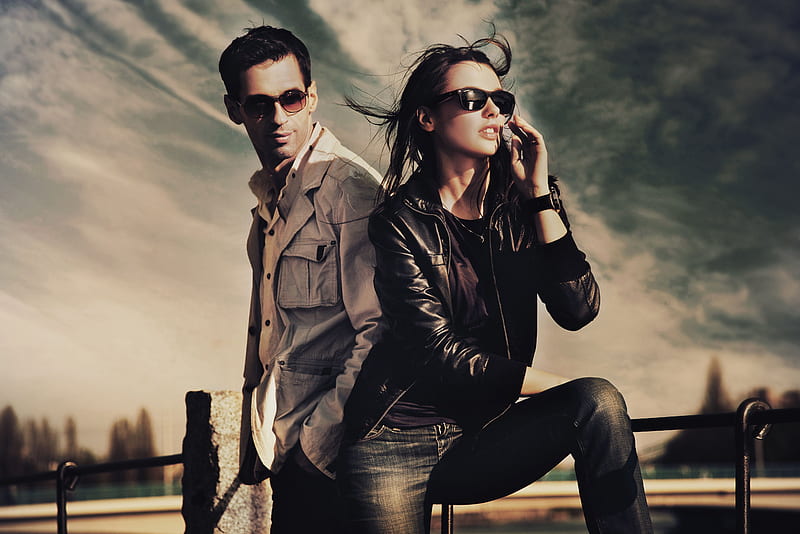 Attractive young couple, pose, bonito, clouds, female model, sunglasses, elegance, young, male model, windy, attractive, hoot, beauty, evening, portrait, fashion, couple, HD wallpaper