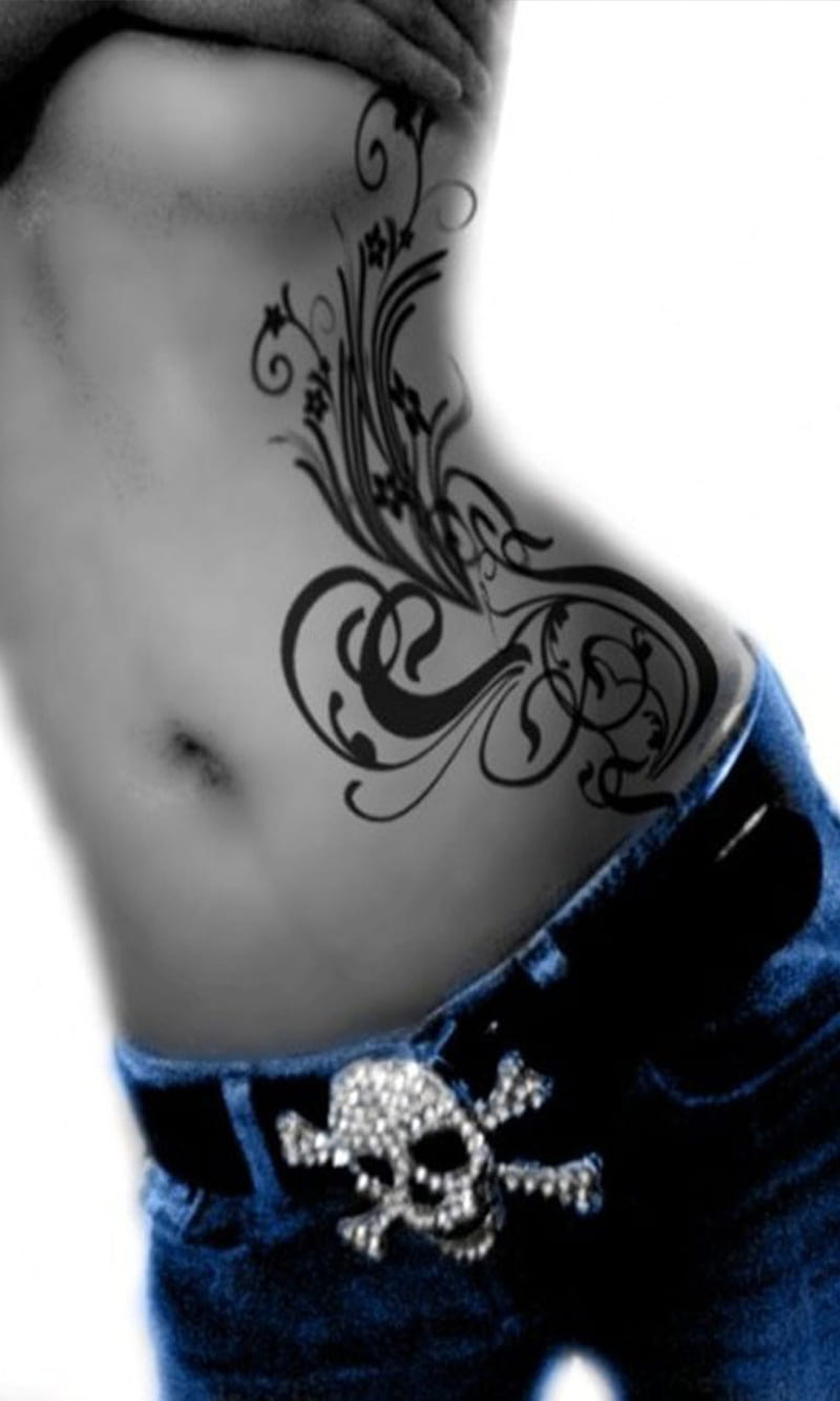 Tribal Design Tattoo On Belly