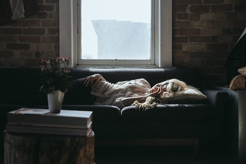 woman lying on sofa near closed window during daytime, HD wallpaper