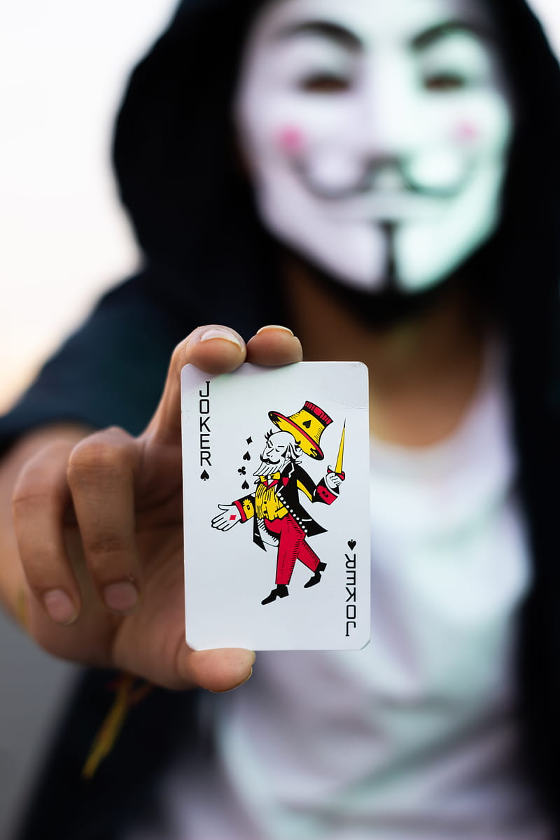 Person Holding Joker Playing Card, HD phone wallpaper