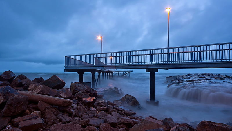 coastal pier on a stormy evening, rocks, peir, clouds, storm, coast, lights, sea, HD wallpaper