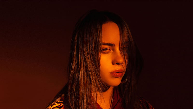 Billie Eilish With Loose Hair Is Having Light On Face In Maroon Background Celebrities, HD wallpaper