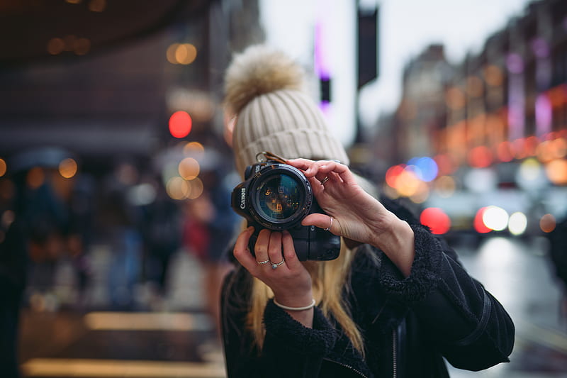 woman holding Canon DSLR camera, HD wallpaper