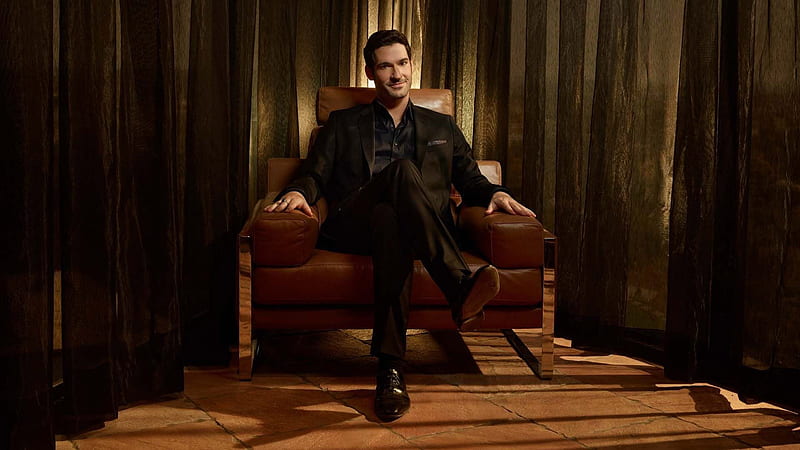 Tom Ellis Is Wearing Black Coat Suit Sitting On Brown Couch Lucifer, HD wallpaper