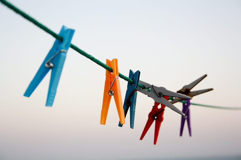 seven assorted-color clothes pegs hanging on rope \, HD wallpaper