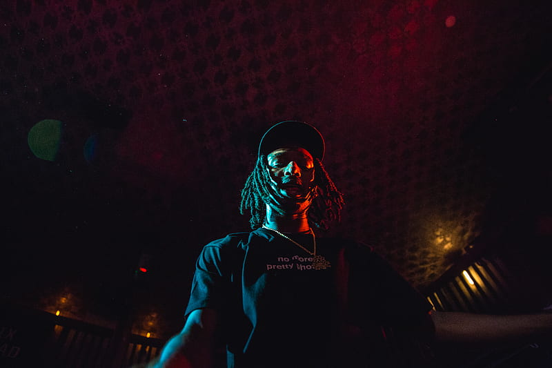 low angle of man wearing cap under red ceiling, HD wallpaper