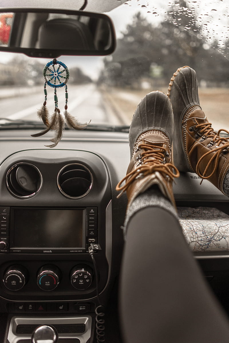 person wearing duck boots putting his boots on vehicle glove compartment, HD phone wallpaper