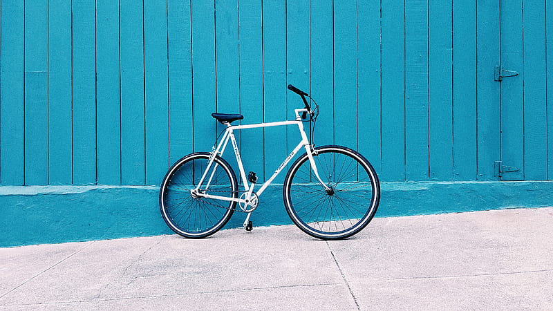 white road bike leaning on teal wooden wall during daytime, HD wallpaper