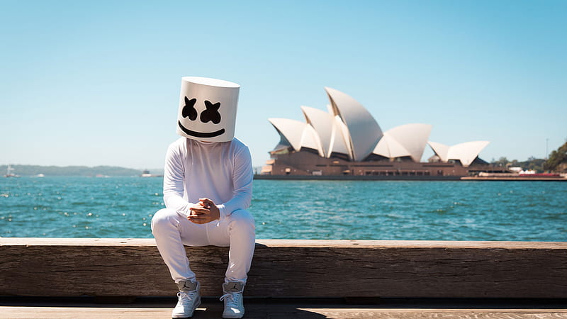 DJ Marshmello Is Sitting On Wood In Ocean Background Wearing White Dress Marshmello, HD wallpaper