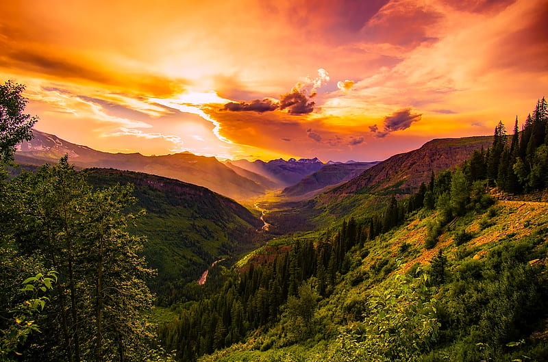 A sunset over a valley HD wallpaper 4k background