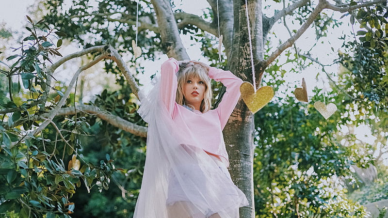 Taylor Swift With Pink Dress Is Standing Near Tree With Holding Hands On Head Taylor Swift, HD wallpaper