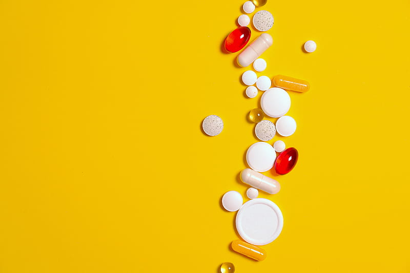 Medication Pills Isolated on Yellow background, HD wallpaper