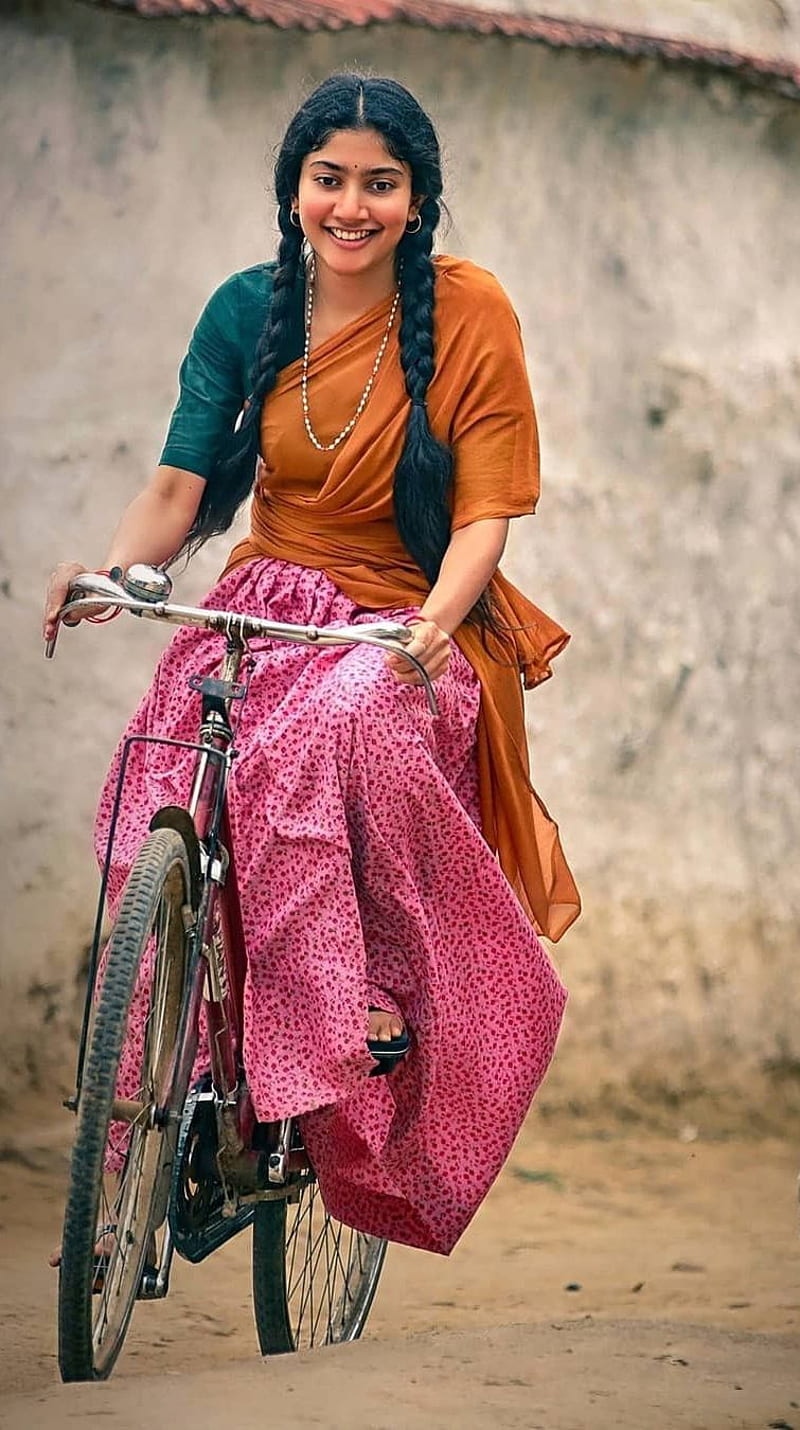 Sai Pallavi , cycling, village girl, HD phone wallpaper