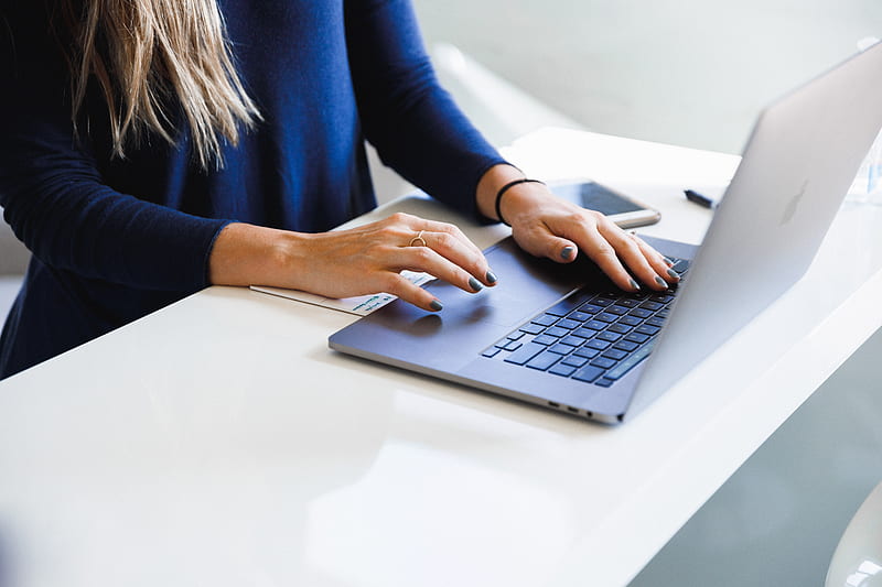 Woman in blue long sleeve shirt using macbook pro, HD wallpaper | Peakpx