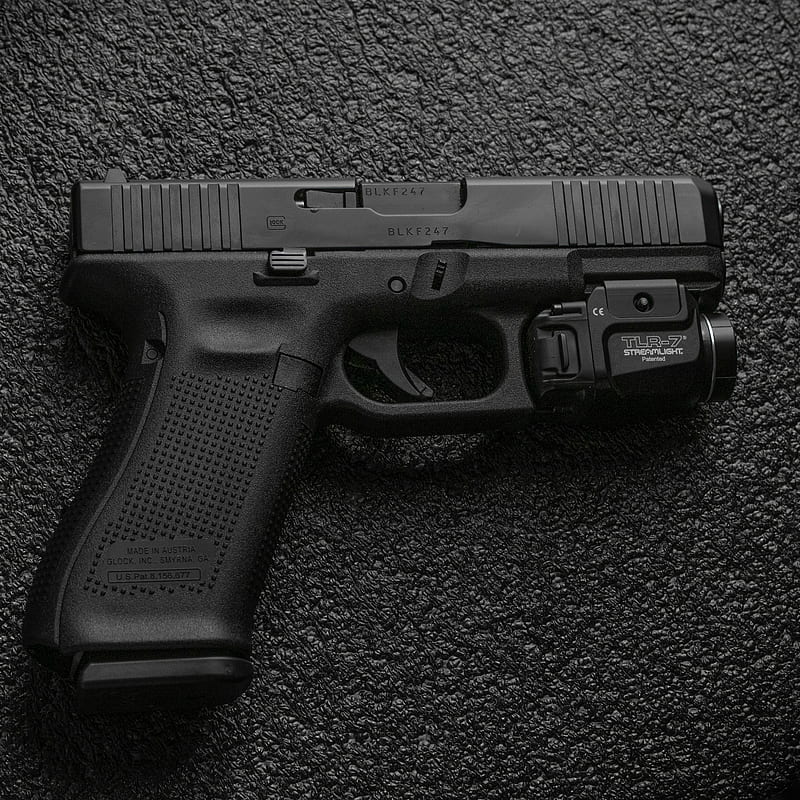 black semi automatic pistol on gray textile, HD phone wallpaper