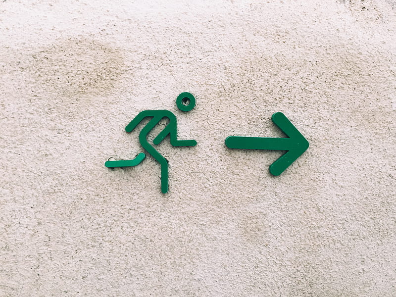 A green sign of a stick figure guy running towards a green arrow., HD wallpaper